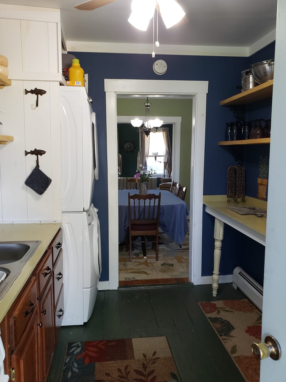 Another view of galley kitchen- front load washer and dryer!