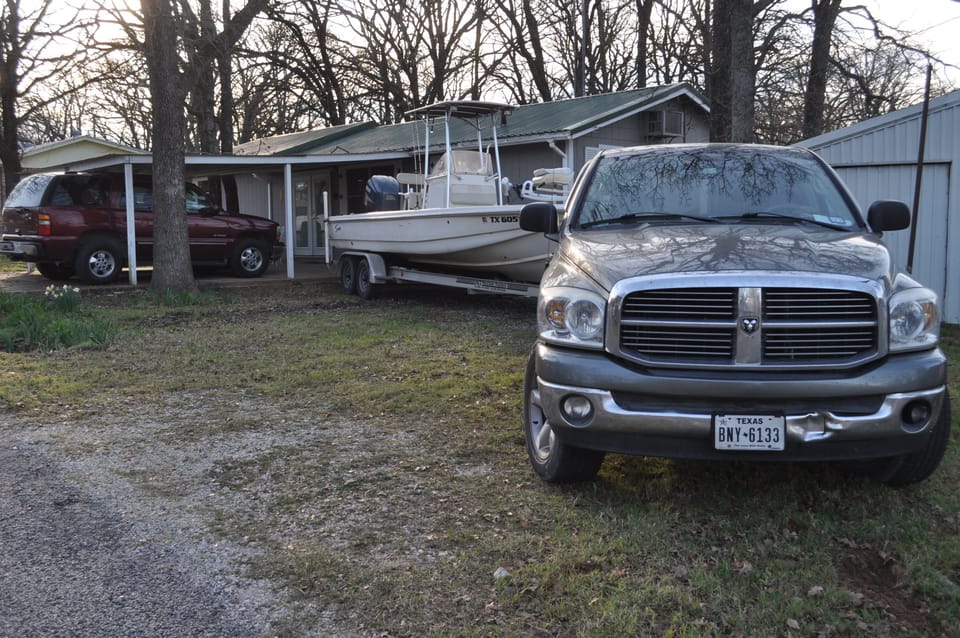 2-car carport, and adjoining space for 20' boat or extra vehicles