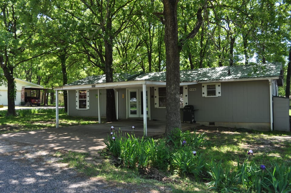 2-car carport and adjoining space for two extra vehicles