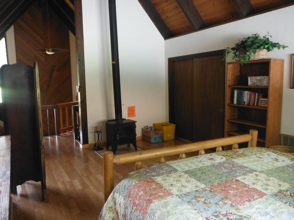 Master loft with woodstove