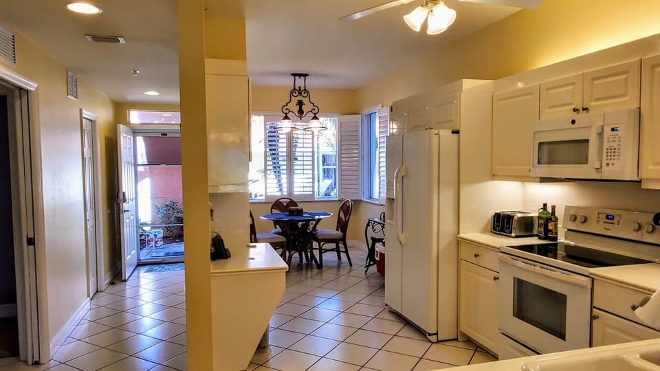 Large eat in kitchen with plenty of space and light. 