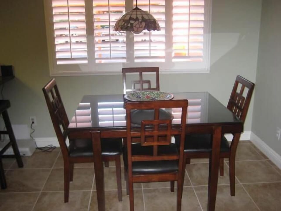 Dining area seats four comfortably