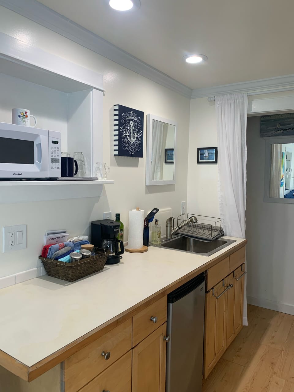 Bright, well stocked kitchen. Perfect for short and long stays.