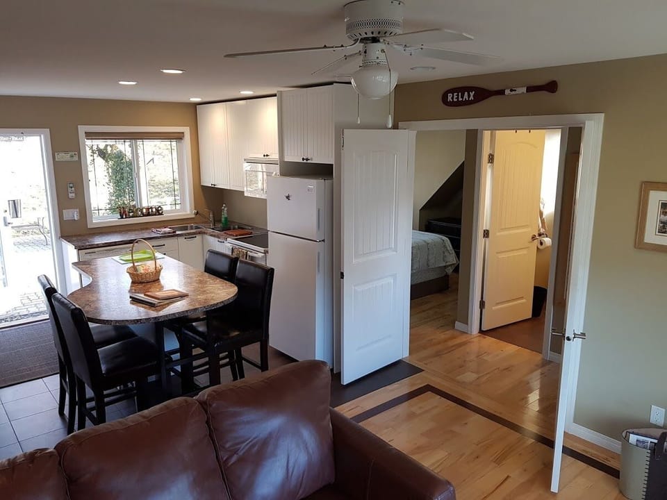 through privacy doors are queen bed/ bunk bed and bath