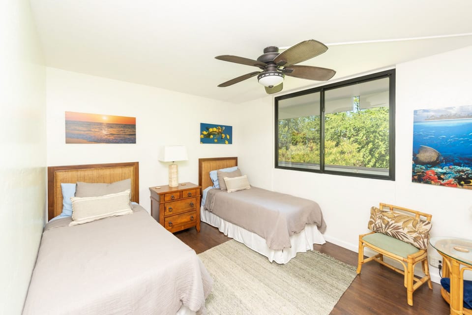 Second bedroom with twin beds. 