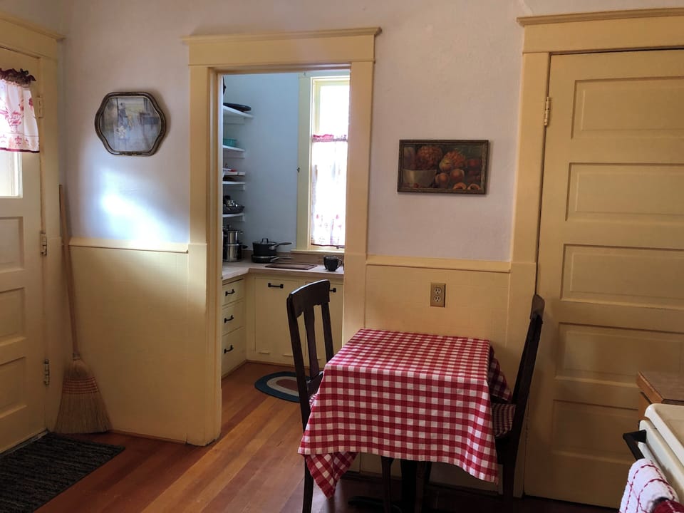 Kitchen Breakfast Nook, door to the back porch with the gas grill, pantry.