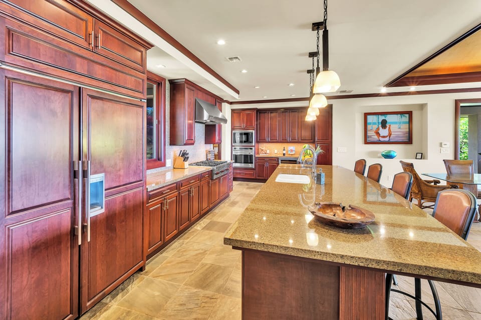 Enjoy cooking in this beautiful kitchen with Wolf range & Sub zero refrigerator