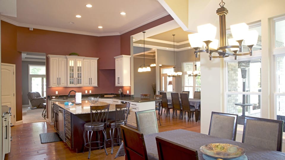 1st floor kitchen with two dinings rooms and two bar side seating