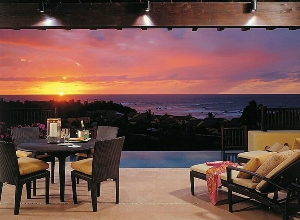 Floor plans highlight outdoor living and ocean views.