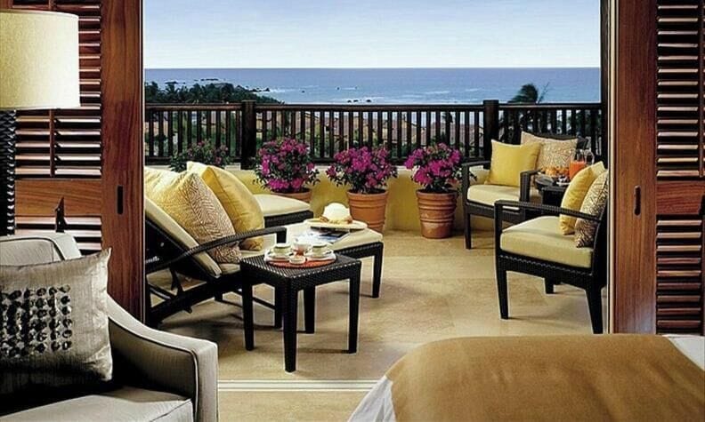 Expansive private terrace with comfortable chaises lounges