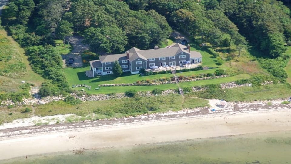 Aerial view of home and beach
