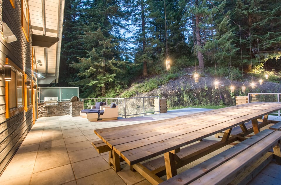 The Back Deck: Our 18ft picnic table for dining outside on summer nights. 