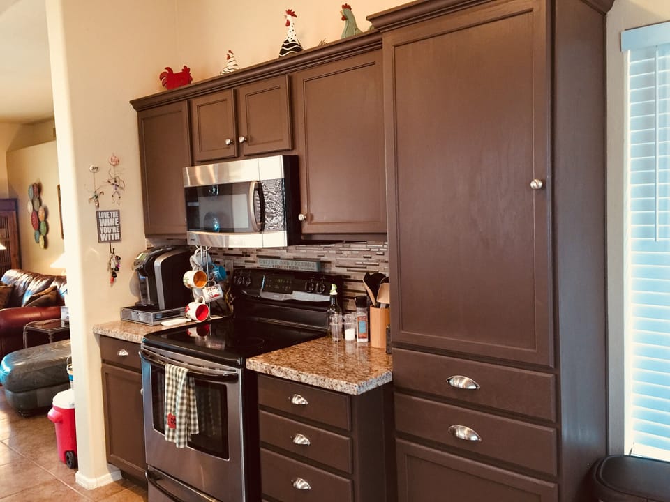 Brand new oven with microwave, Keurig coffee maker, and ample cabinet storage 
