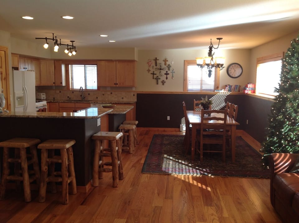 Dining table with 6 chairs and 5 bar stools for plenty of seating options