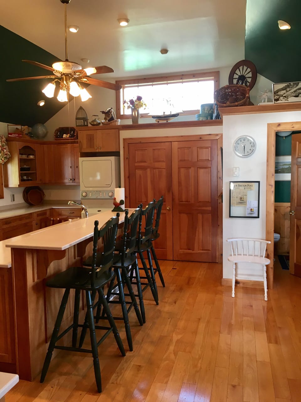 Fully Equipped Kitchen with Laundry and adjacent Powder Room
