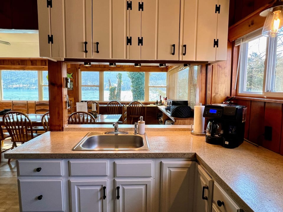 The kitchen features a pass through to the Dining Room, great for entertaining!