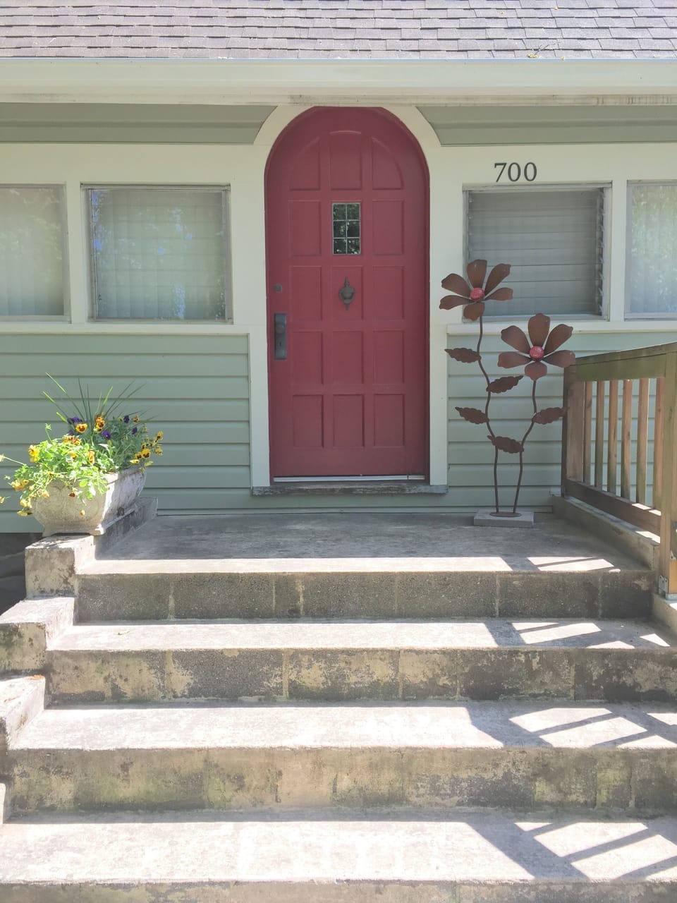 Front of house with the original door, giving it lots of charm!