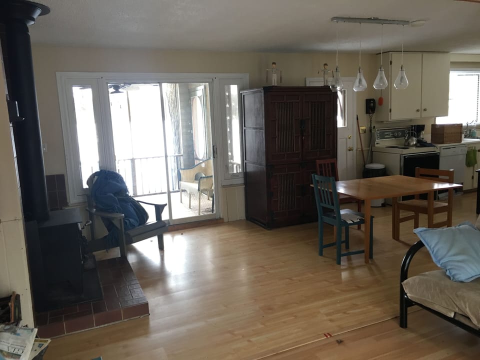 Living room area, exit to screen in porch