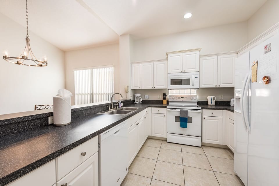 Gourmet kitchen, stocked with spices, cooking supplies, foil, ziploc bags, more!