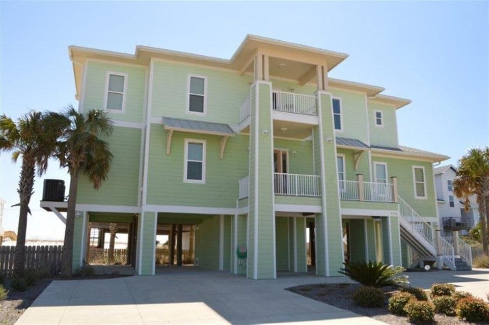 3 story home with breezeway, ample parking and great views-so close to the beach