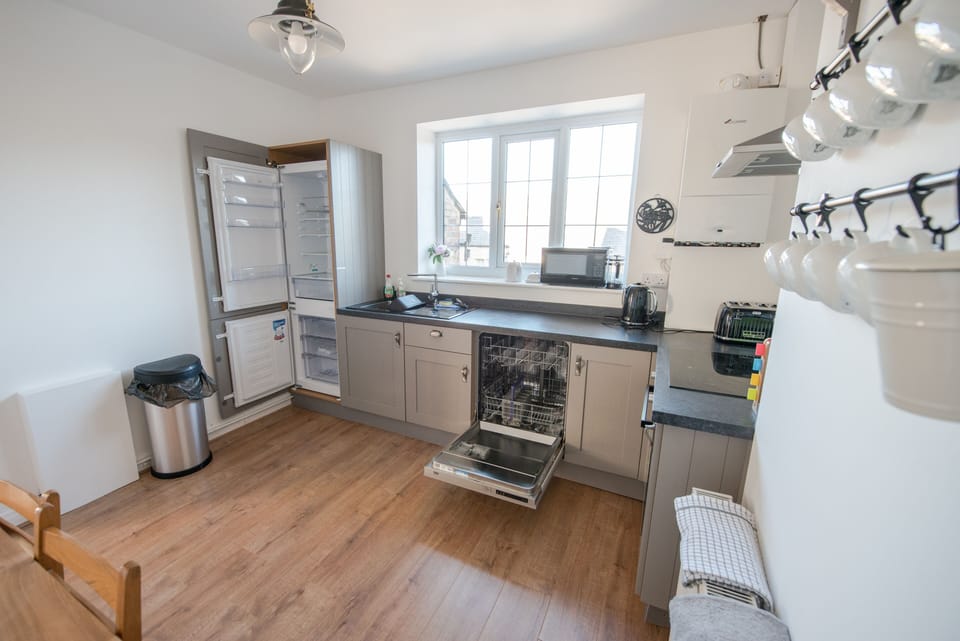 Large kitchen with dining table for 4