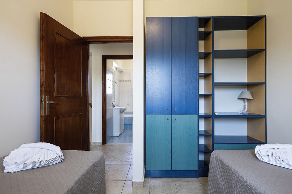 Bedroom near a full bathroom