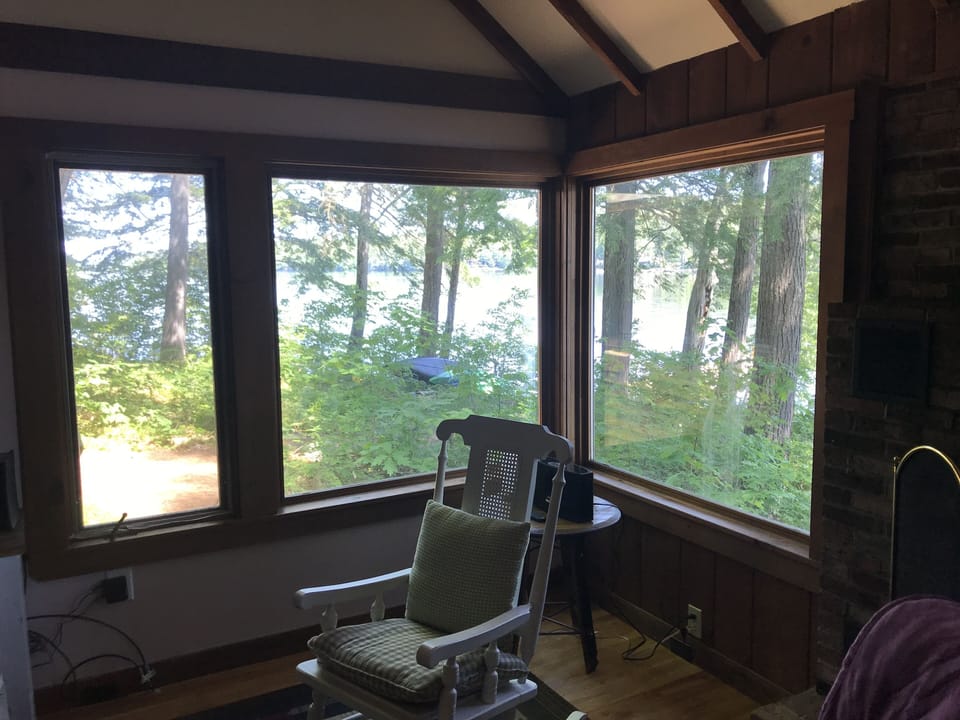 picture windows toward lake and dock