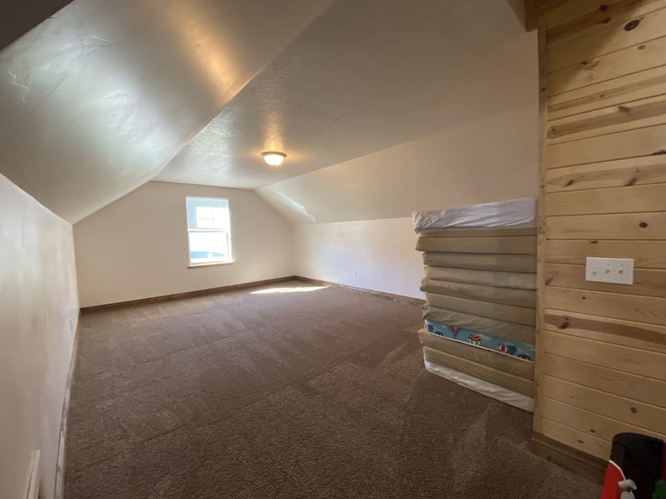 Bonus room sleeping area. 30 bunk mattresses provided