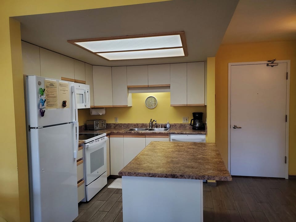 Our kitchen is fully stocked with all the comforts of home.