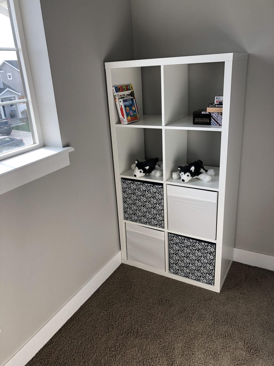 Upstairs small playroom loft with toys, books, table and chairs