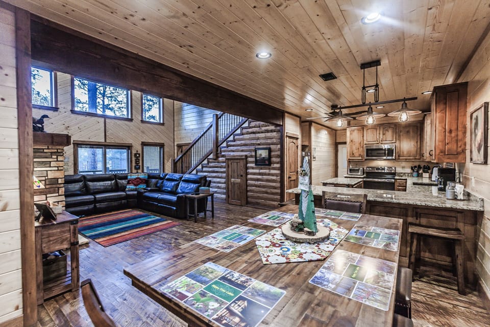 Cabin Entry - Dining Table, Kitchen, Great Room, and Open Windows
