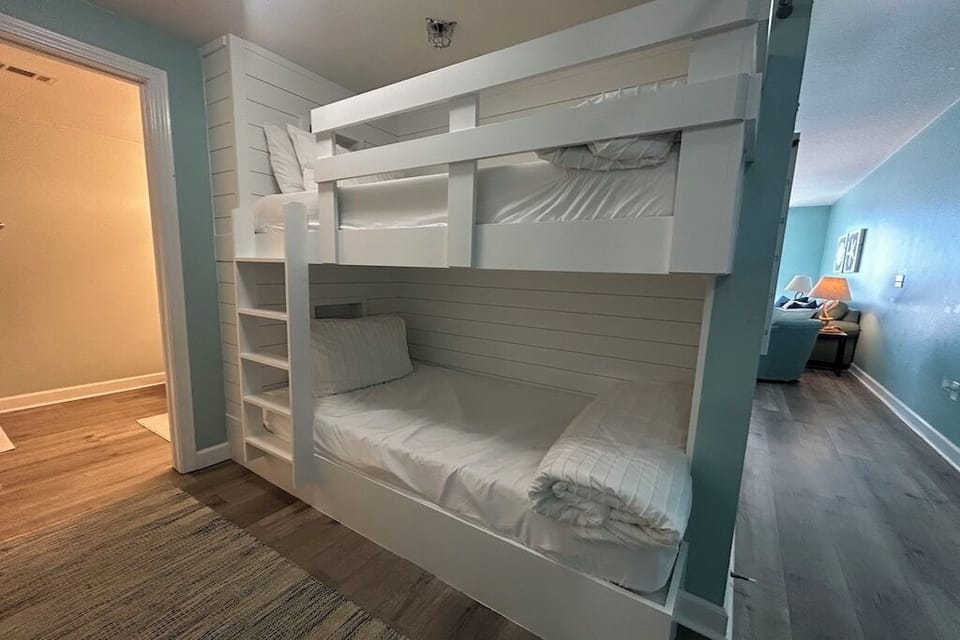 Beautiful custom built in bunk beds added November 2024 with memory foam beds.