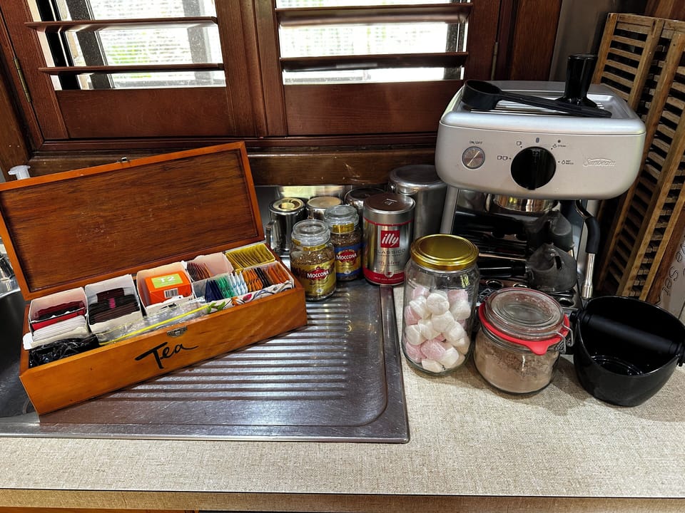 Variety of teas, hot chocolate, coffees and ground expresso machine