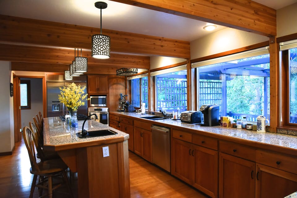 Large island with second sink and stovetop