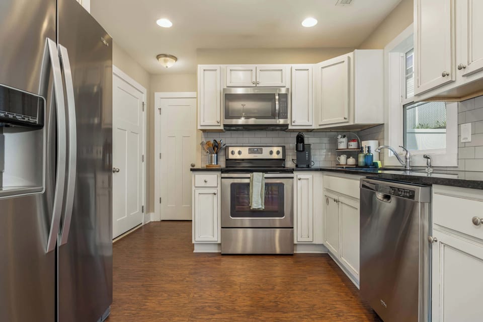 Stainless appliances, subway tile, and a pantry. Everything you need to channel your inner chef.