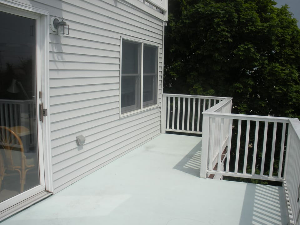 .Front deck off 3rd floor bedroom. House has 4 decks!
