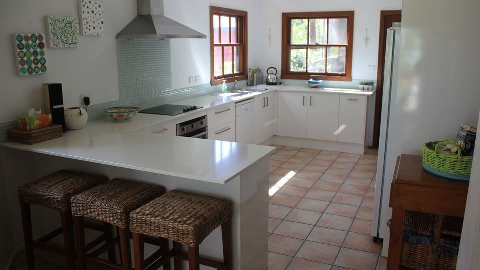 Light filled spacious kitchen with modern appliances.