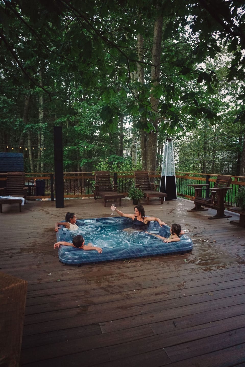 Create great memories with loved ones in our 7 person hot tub and wrap around deck.