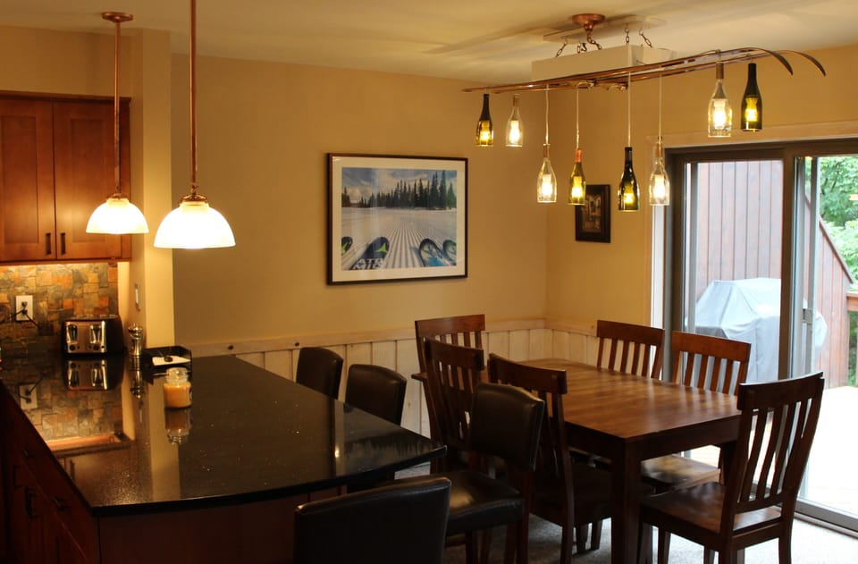 We love skiing and we love wine!  This custom built chandelier combines both!
