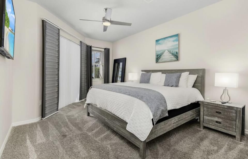 Master bedroom has amazing view of pool and waterfront; high end KING mattress 