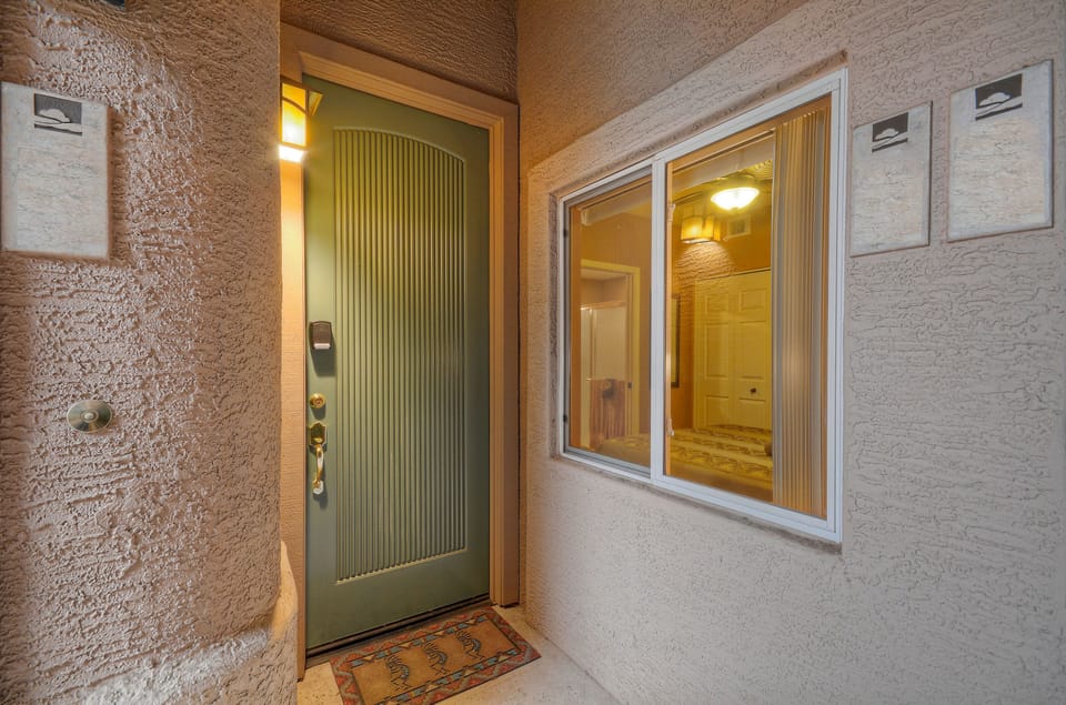 View of the private front entrance and window in second bedroom.