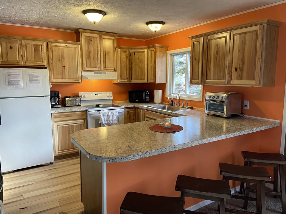 Fully stocked kitchen located on the second floor.