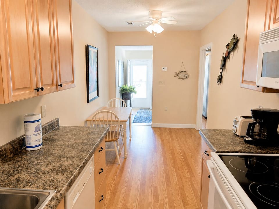 Gally kitchen next to living area