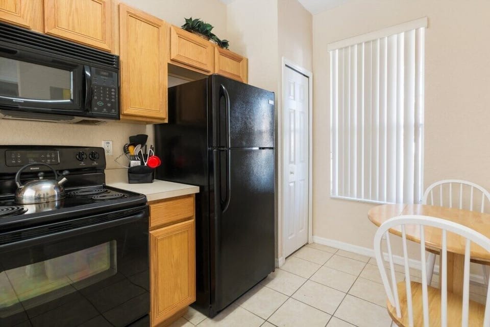 Open-concept kitchen with plenty of counter space for cooking.