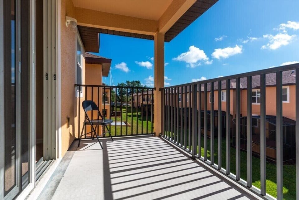 Private balcony with a relaxing view of the greenery.