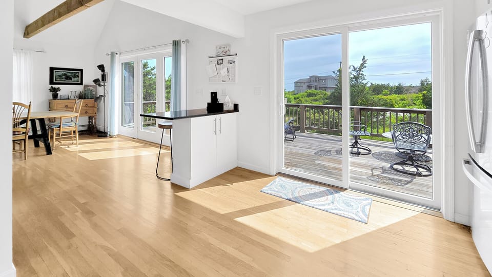 Kitchen has a slider to the deck