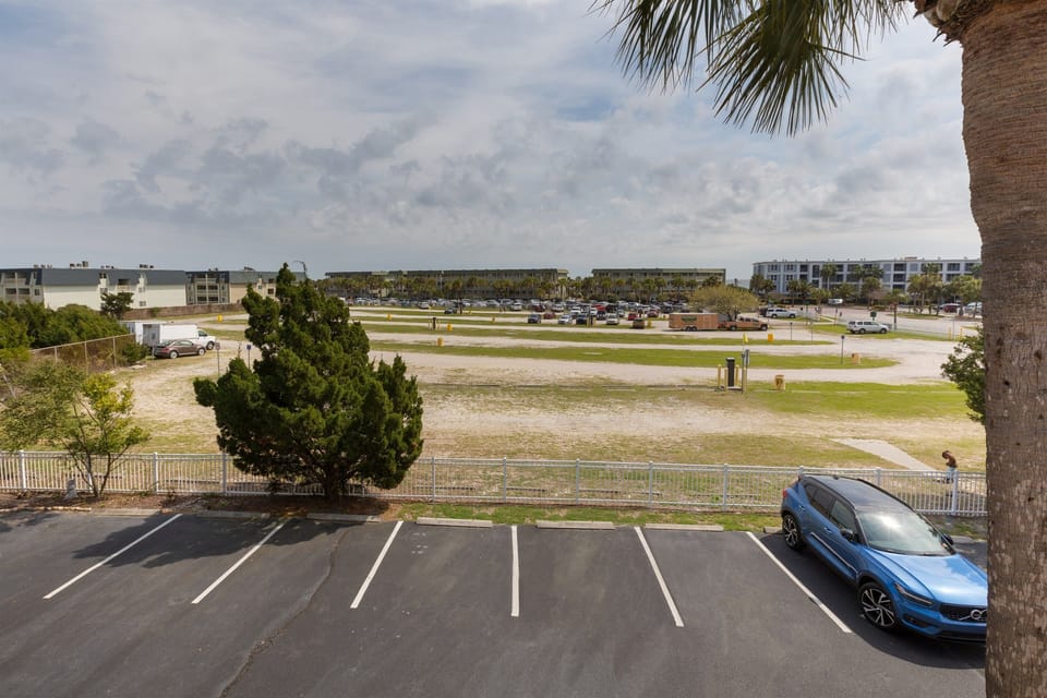 Wide lens view out the front door.  Parking pass provided (and required) for guests and owners to park in our private lot.