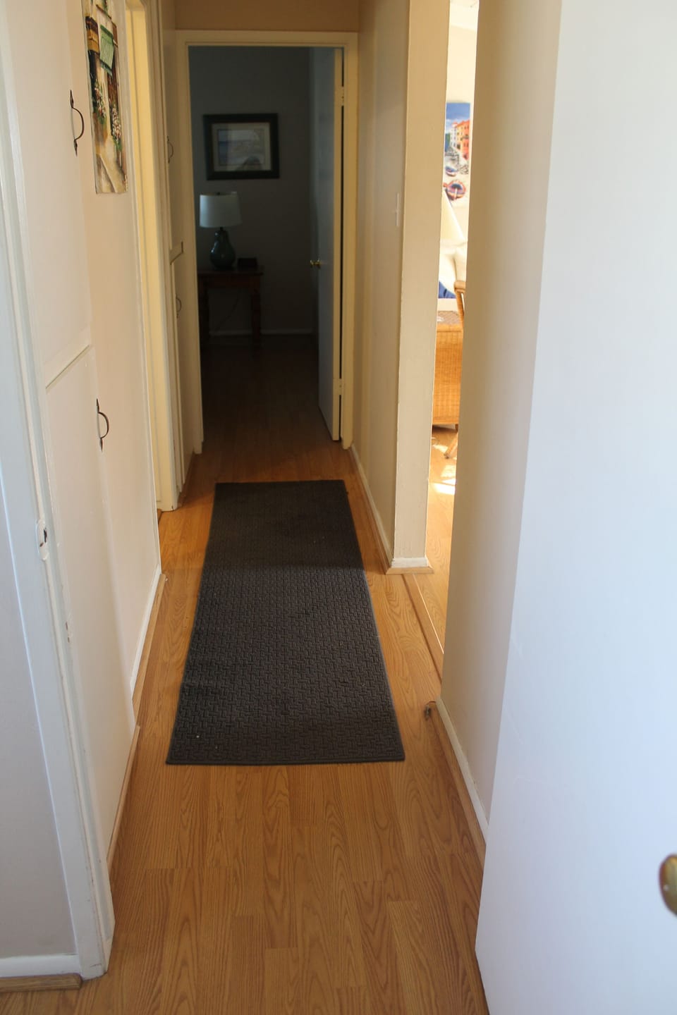 The hallway connecting the two bedrooms. Identical floor plans for both units