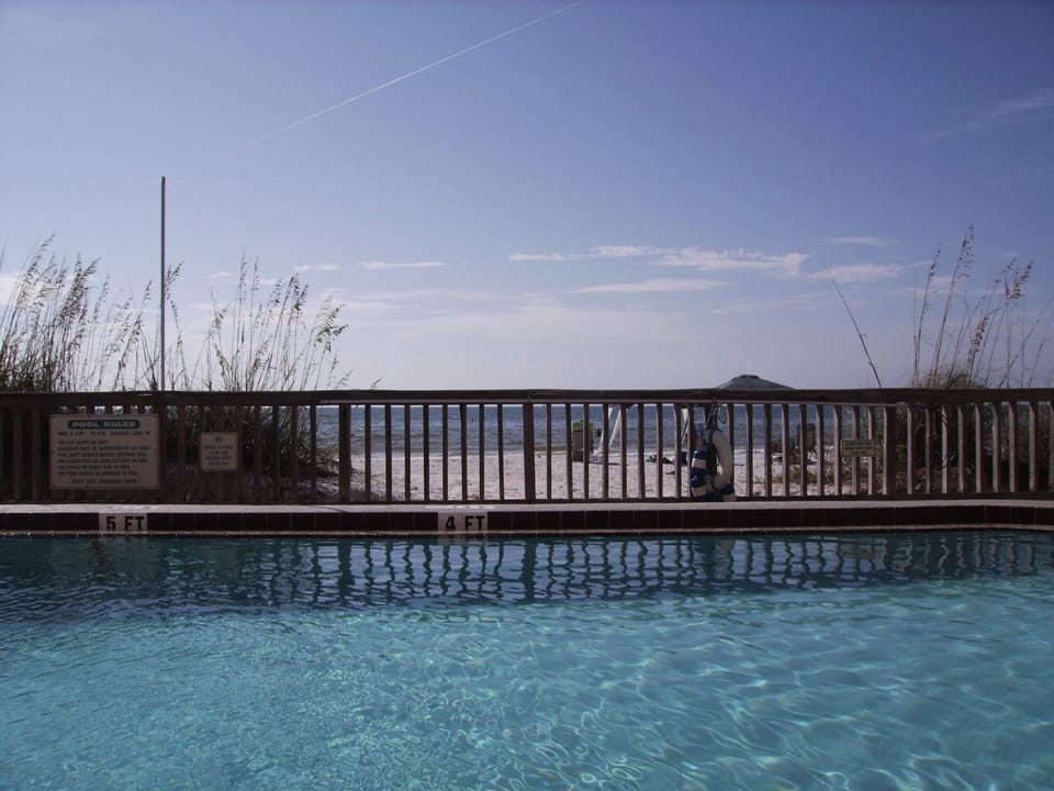 VIEW OF OCEAN & BEACH FROM HEATED POOL PEGGYS PLACE ON THE BEACH