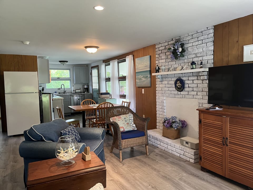 Living area open to kitchen (new stainless fridge not pictured)